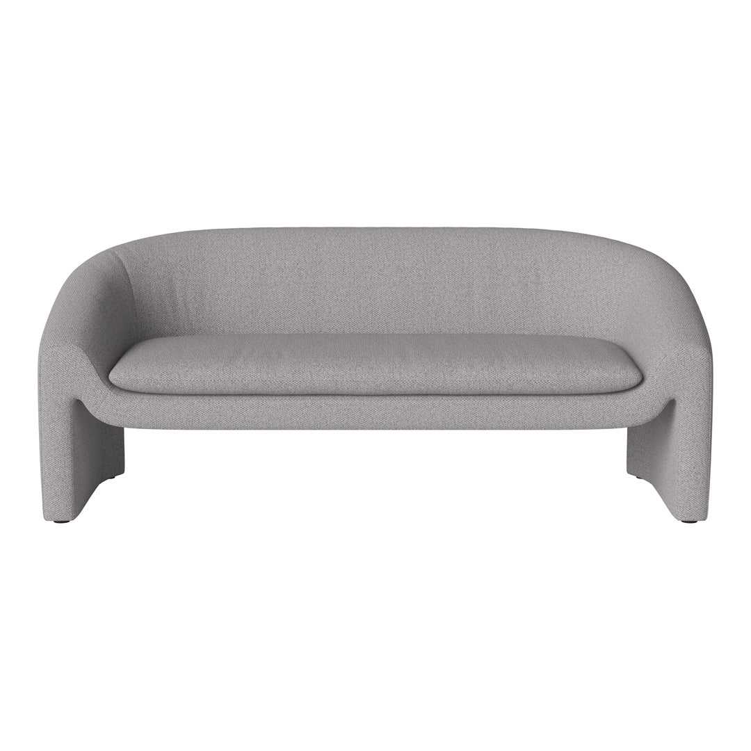 Minimalist gray sofa with subtle texture and smooth, rounded edges for a modern aesthetic.