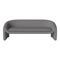 Gray fabric sofa with a smooth texture and modern curved design, perfect for contemporary and minimalist decor.