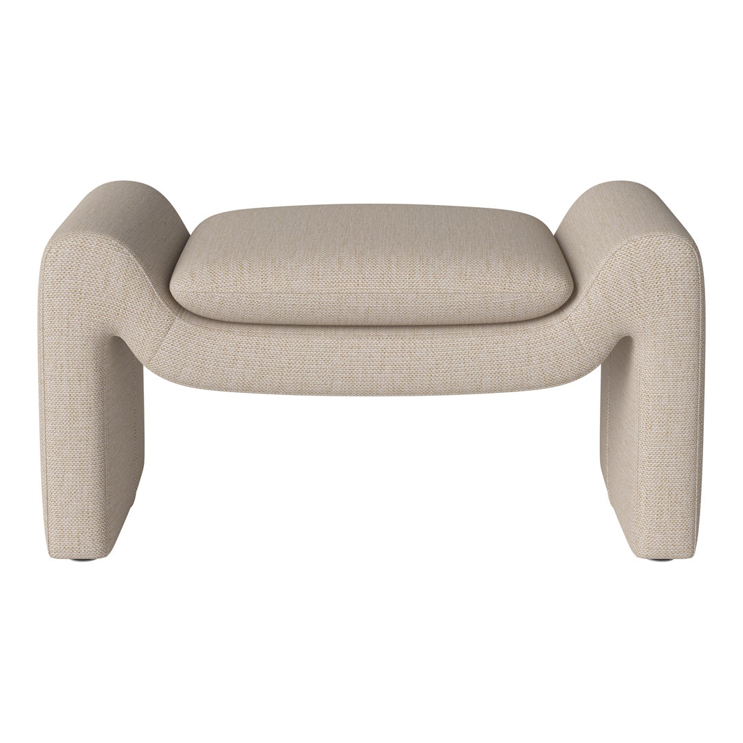 Beige upholstered ottoman with textured fabric and rounded edges, perfect for modern decor.