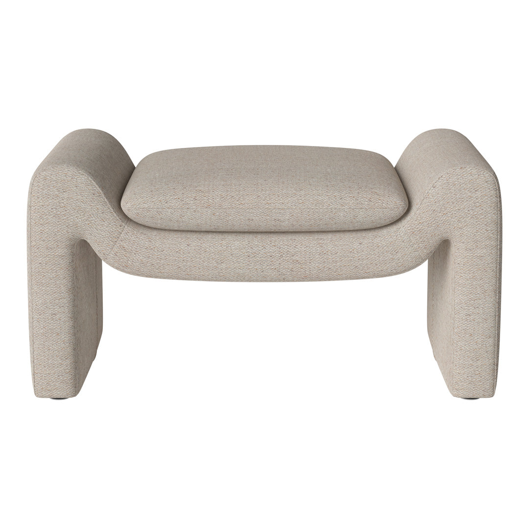 Beige upholstered ottoman with a textured pattern and curved design, perfect for modern decor.