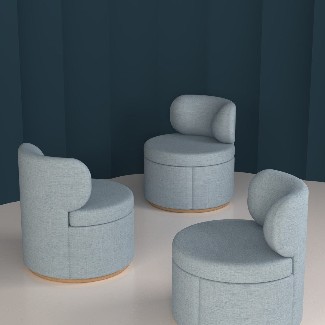 Light blue upholstered chairs with rounded backs and wooden bases, set against a dark teal background.