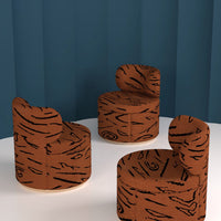 Rustic orange chairs with bold black wood grain patterns, perfect for modern or eclectic decor.