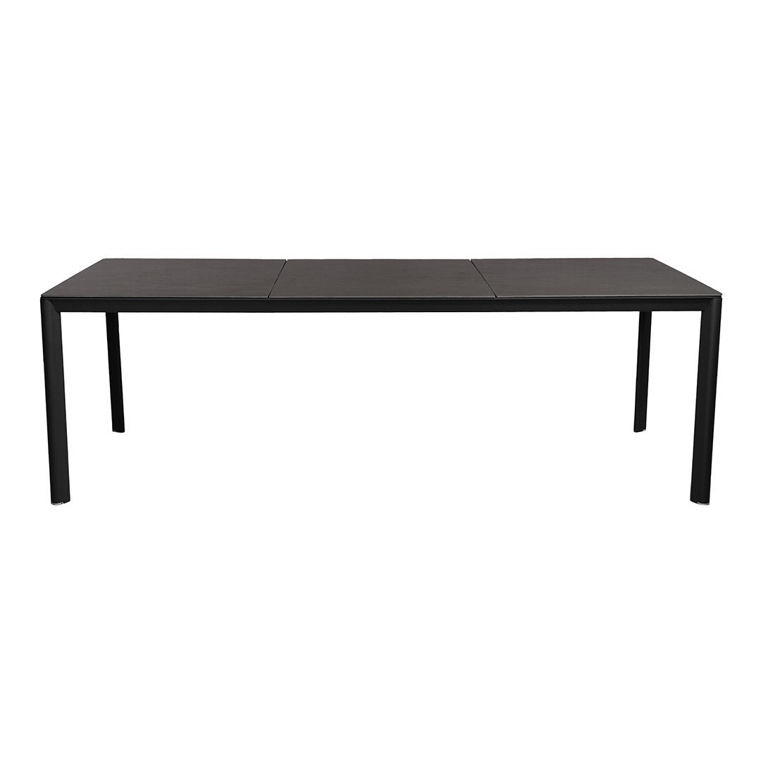 Sleek black dining table with a smooth, solid surface and minimalistic design. Perfect for modern interiors.