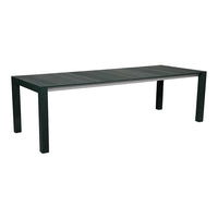 "Solid dark green table with a sleek, minimalistic design and textured surface."