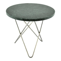 Round green marble tabletop with smooth surface, supported by sleek silver metal legs in a geometric design.