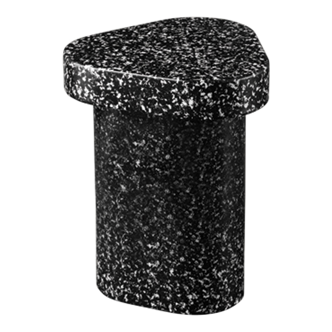 Black and white speckled marble accent table with a unique triangular top and cylindrical base.