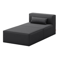 Stylish black bed with a sleek, modern design and smooth fabric, featuring a simple, minimalist aesthetic.