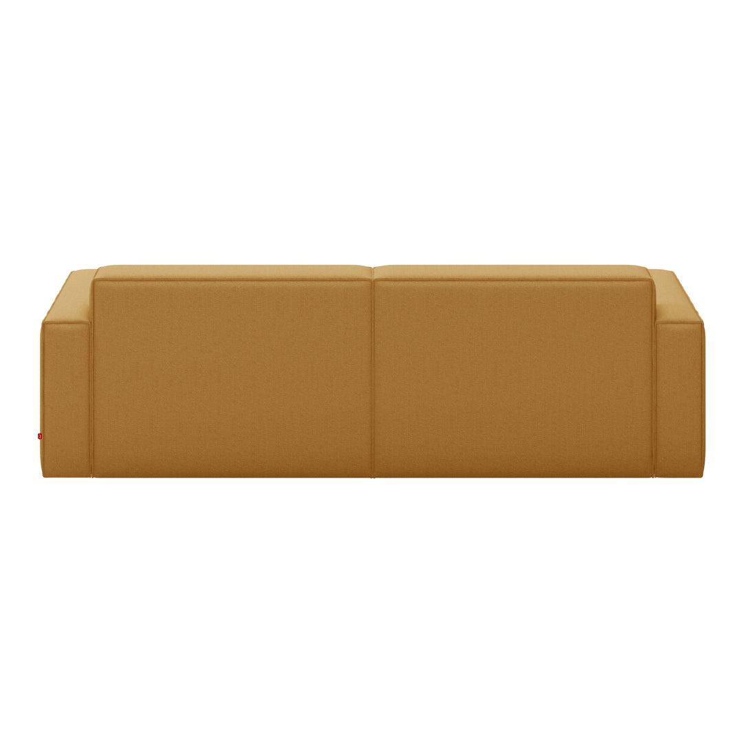 Tan modular sofa with a smooth, minimalist design and sleek, contemporary lines. Perfect for modern interiors.