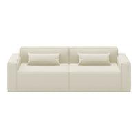 Cream-colored minimalist sofa with smooth upholstery and two matching cushions. Perfect for modern living spaces.
