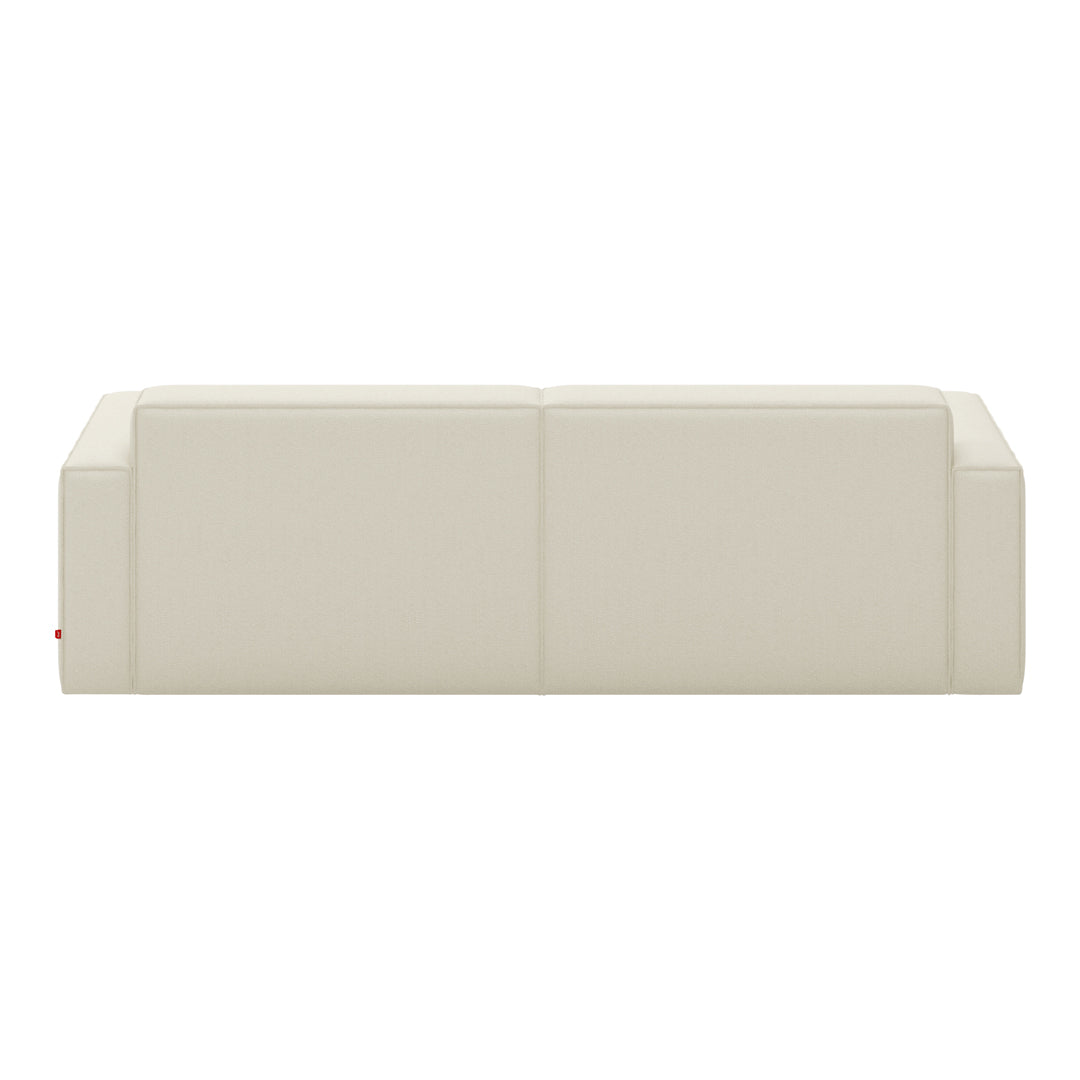 Neutral beige modern sofa with a minimalist design and smooth upholstery. Perfect for contemporary living spaces.