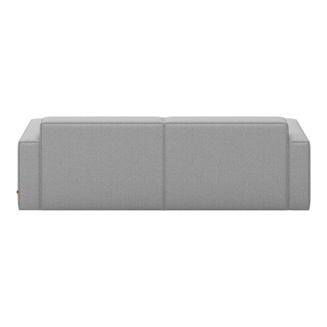 Stylish gray fabric sofa with a smooth texture and minimalist design, perfect for modern interiors.