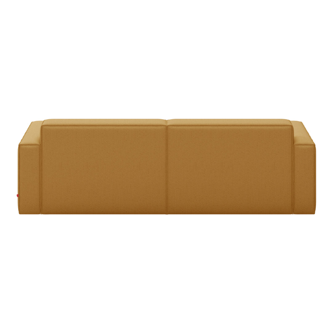 "Stylish mustard yellow sofa with a sleek, modern design and minimalistic pattern, perfect for contemporary decor."