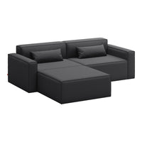 Black upholstered sectional sofa with sleek lines and minimalist design. Ideal for contemporary living spaces.