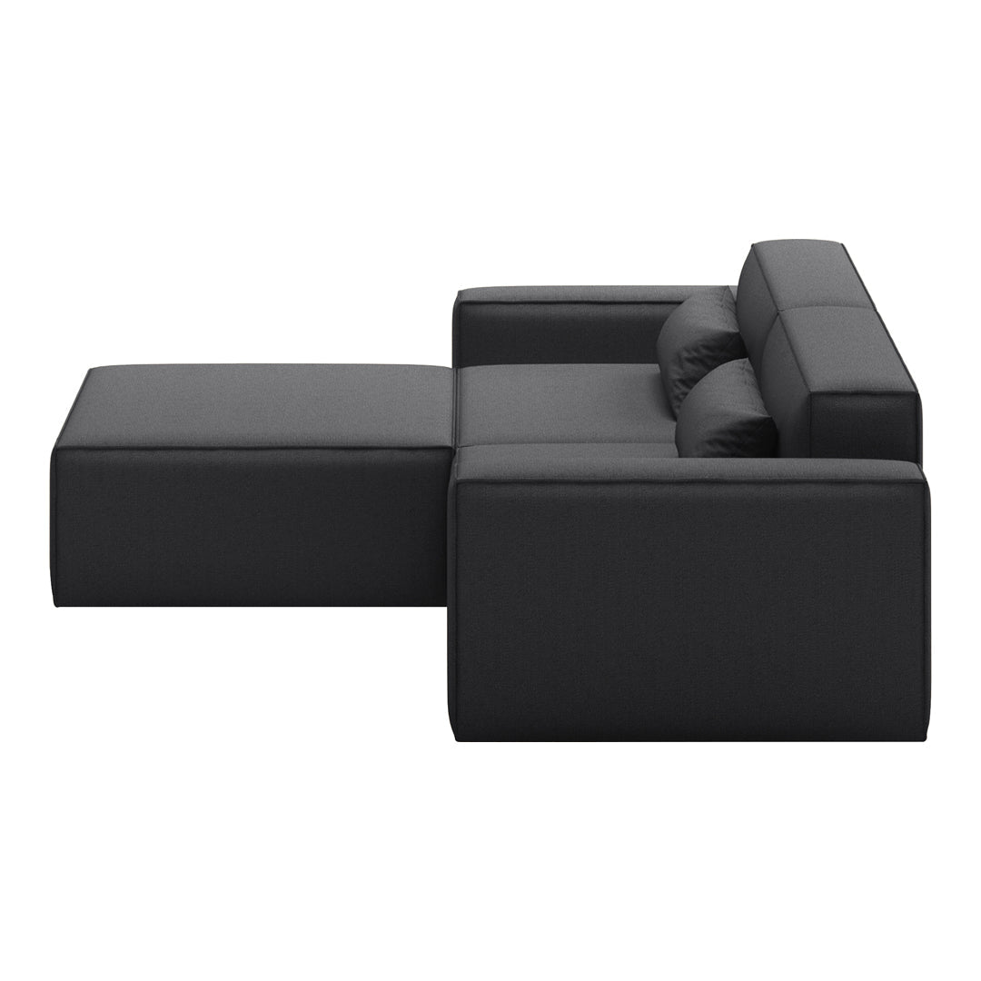 Black modular sofa with sleek, contemporary design and smooth surfaces, perfect for modern interiors.