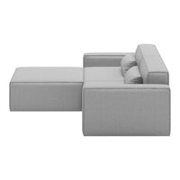 Light gray sectional sofa with a modern, minimalist design and subtle textured fabric pattern.