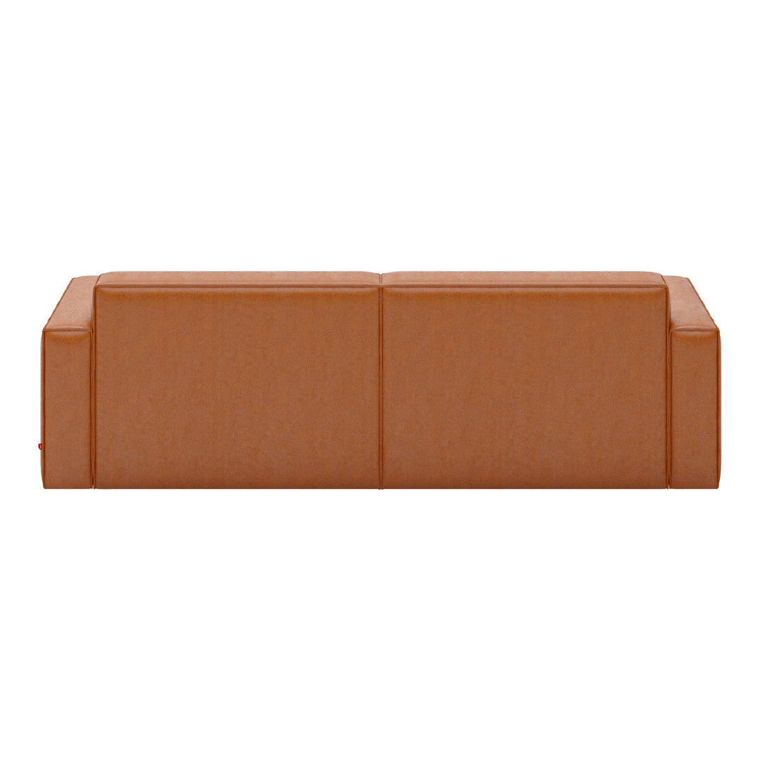 Modern brown leather sofa with a minimalist design and smooth texture, featuring clean lines and a sleek silhouette.