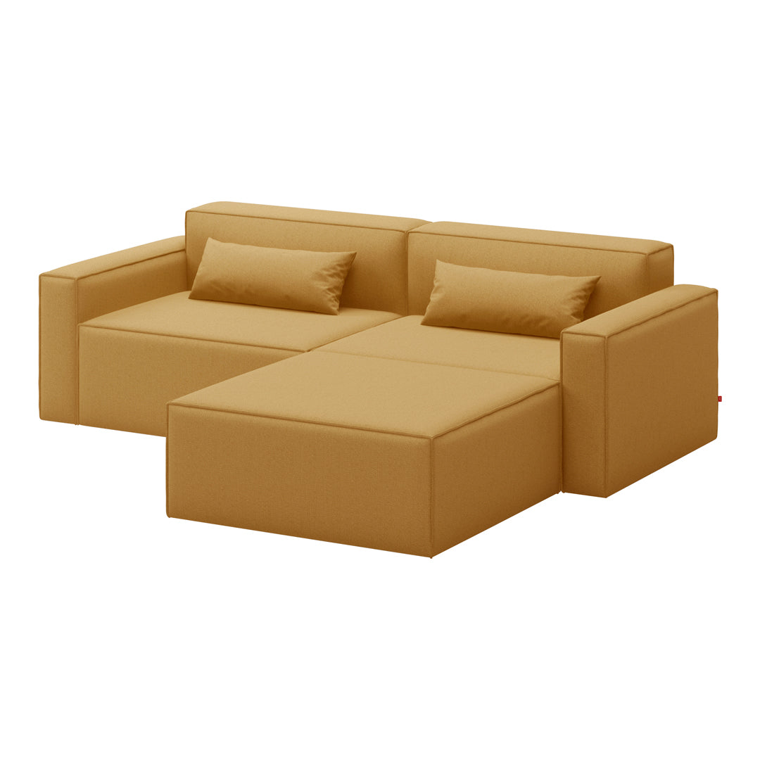 Tan modular sofa with clean lines and minimalist design, featuring smooth fabric and contemporary style.