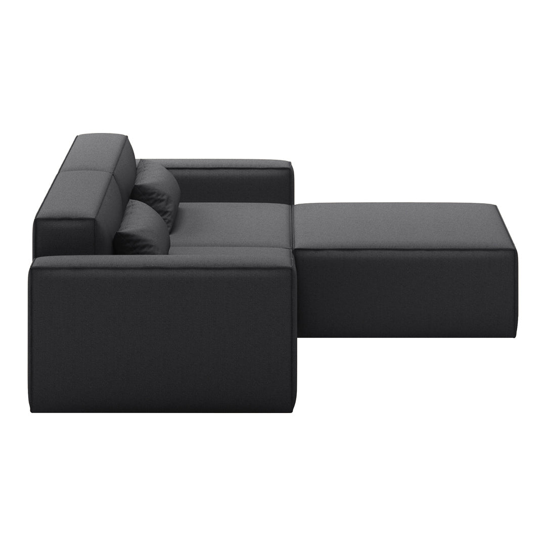 Sleek black modular sofa with a minimalist design and smooth texture, perfect for modern interiors.