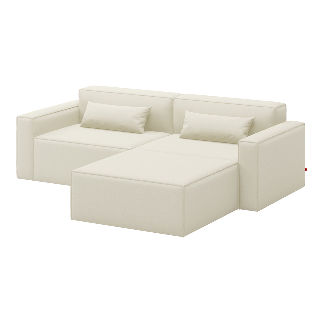Light beige sectional sofa with smooth, minimalist design and matching cushions. Perfect for modern interiors.