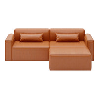 Modern orange leather sectional sofa with smooth texture and simple rectangular pattern. Perfect for stylish living rooms.