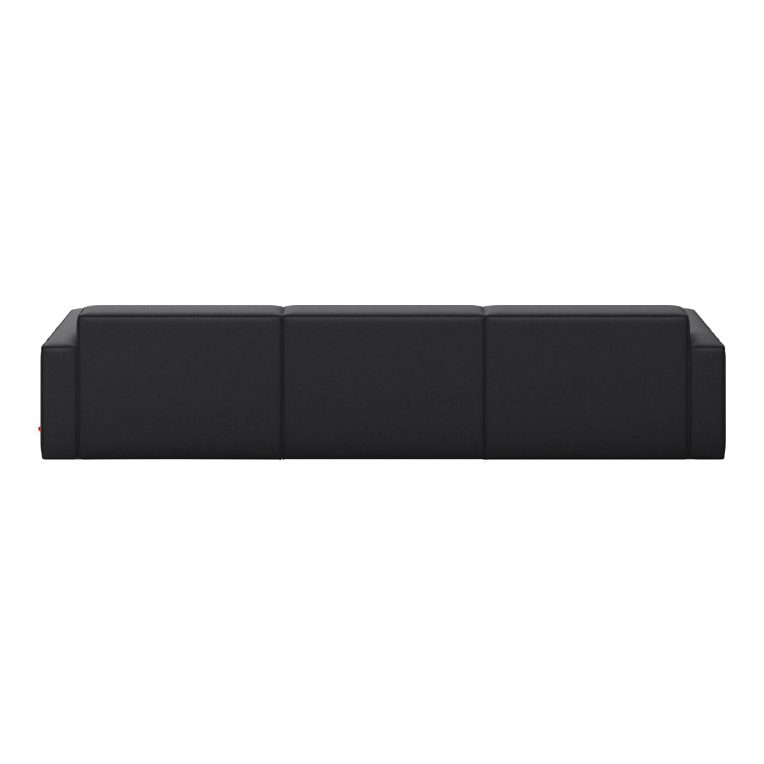 Sleek black sofa with a minimalist design and smooth, solid surface texture. Perfect for modern interiors.