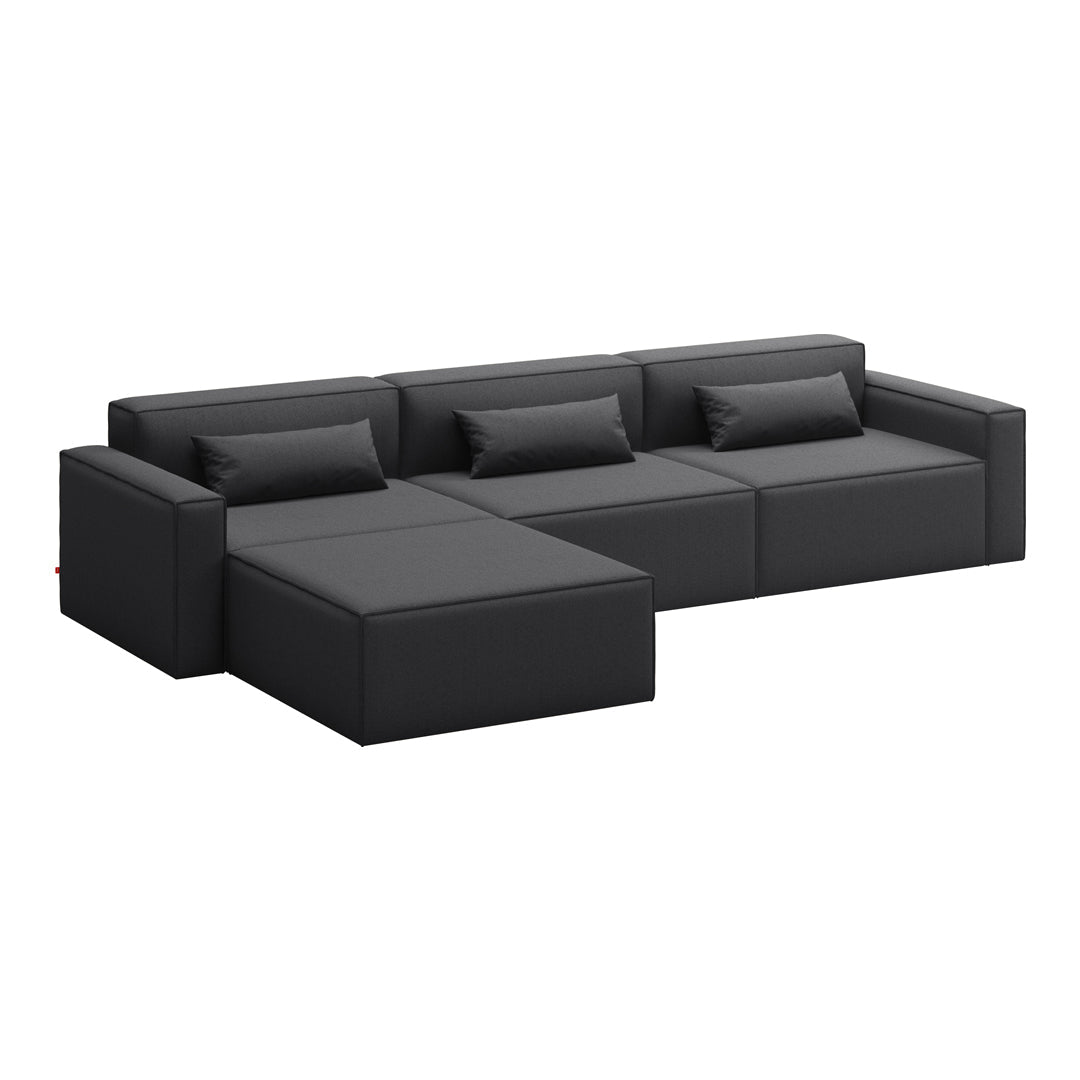 Black leather sectional sofa with clean lines and smooth texture, featuring plush cushions for comfort.
