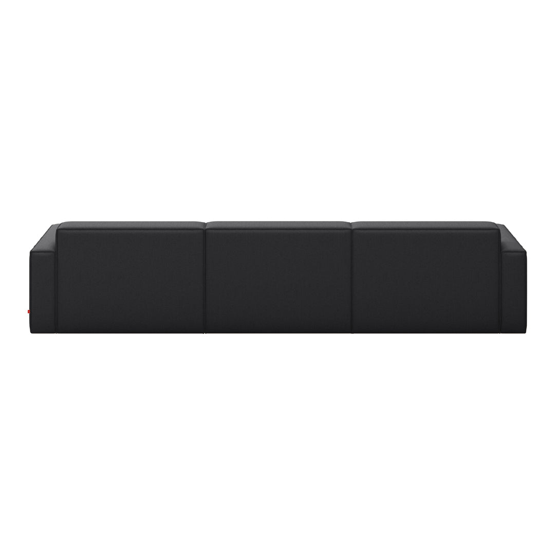 Modern black sofa with sleek, minimalist design and smooth fabric texture, perfect for contemporary living spaces.