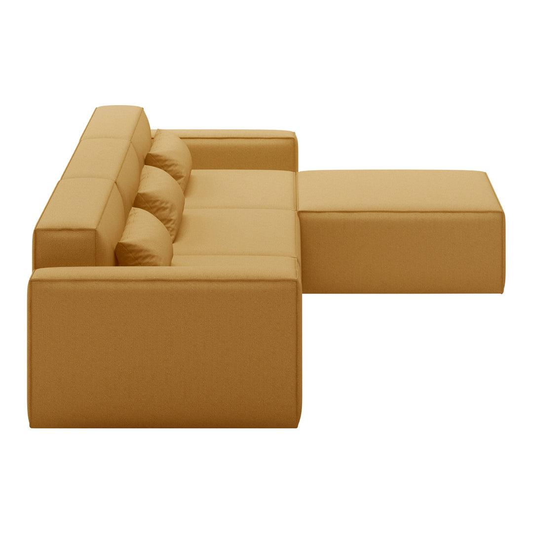 Modern sectional sofa in warm mustard yellow fabric with a smooth, minimalist design and plush cushions.