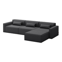 Modern black sectional sofa with sleek lines and solid, minimalist design. Perfect for contemporary living spaces.