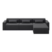 Black sectional sofa with a sleek, modern design and subtle textured cushions. Perfect for any contemporary living space.