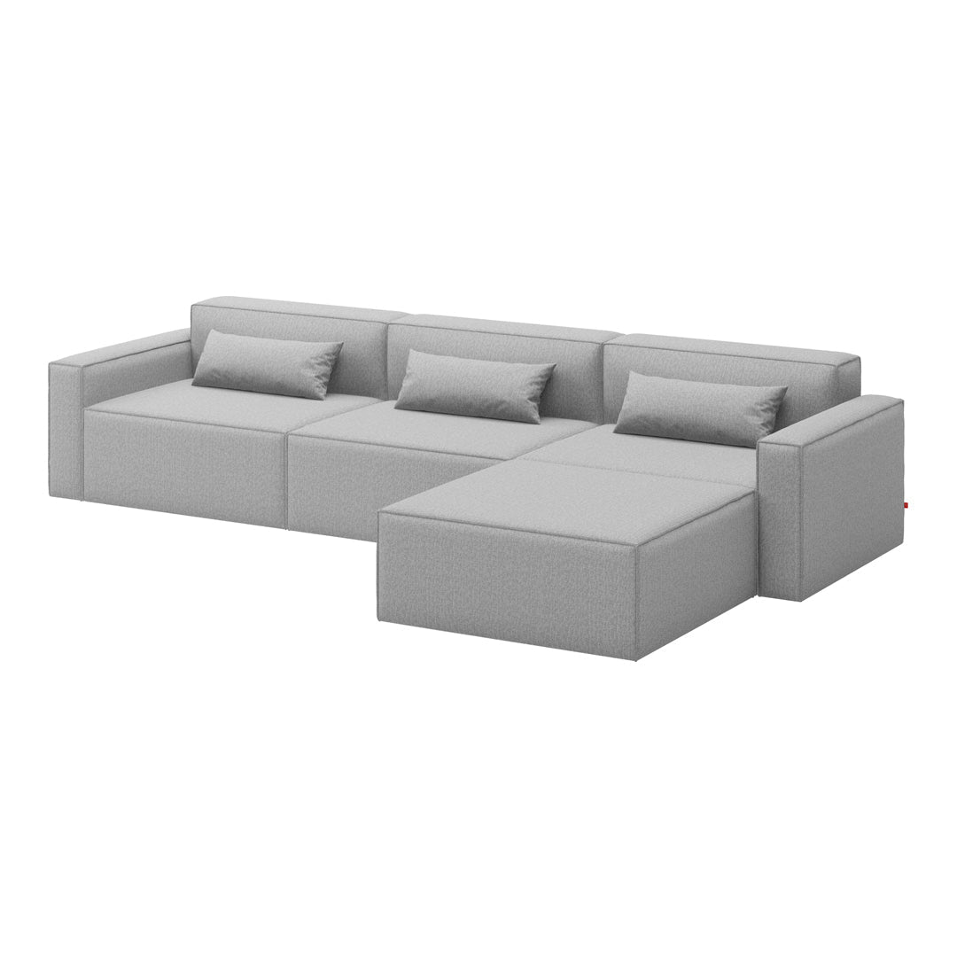 Modern gray sectional sofa with a clean, minimalist design and plush cushions. Suitable for contemporary interiors.