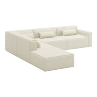 Modern cream sectional sofa with clean lines and minimalist design, featuring a solid, smooth surface.