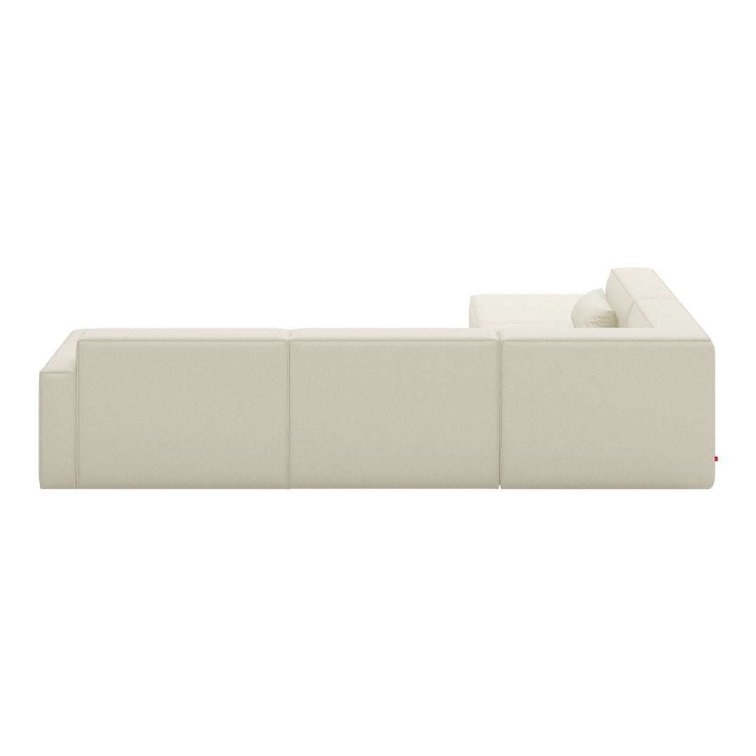 Cream-colored modular sofa with sleek, minimalist design and smooth, textured surfaces. Ideal for modern interiors.
