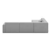 Modern gray sectional sofa with clean lines and a textured fabric design, perfect for contemporary living spaces.