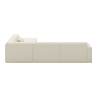 Beige sectional sofa with smooth, modern lines and a minimalist design. Perfect for contemporary living spaces.