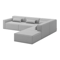 Light gray sectional sofa with a modern minimalist design and clean lines, featuring plush cushions.