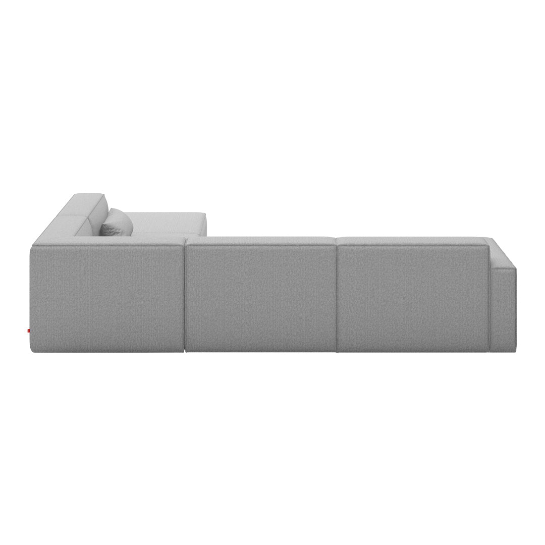 Stylish light gray sectional sofa with a modern, minimalist design and textured fabric.