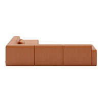 Rust orange sectional sofa with a smooth, modern design and subtle stitching patterns. Perfect for contemporary decor.