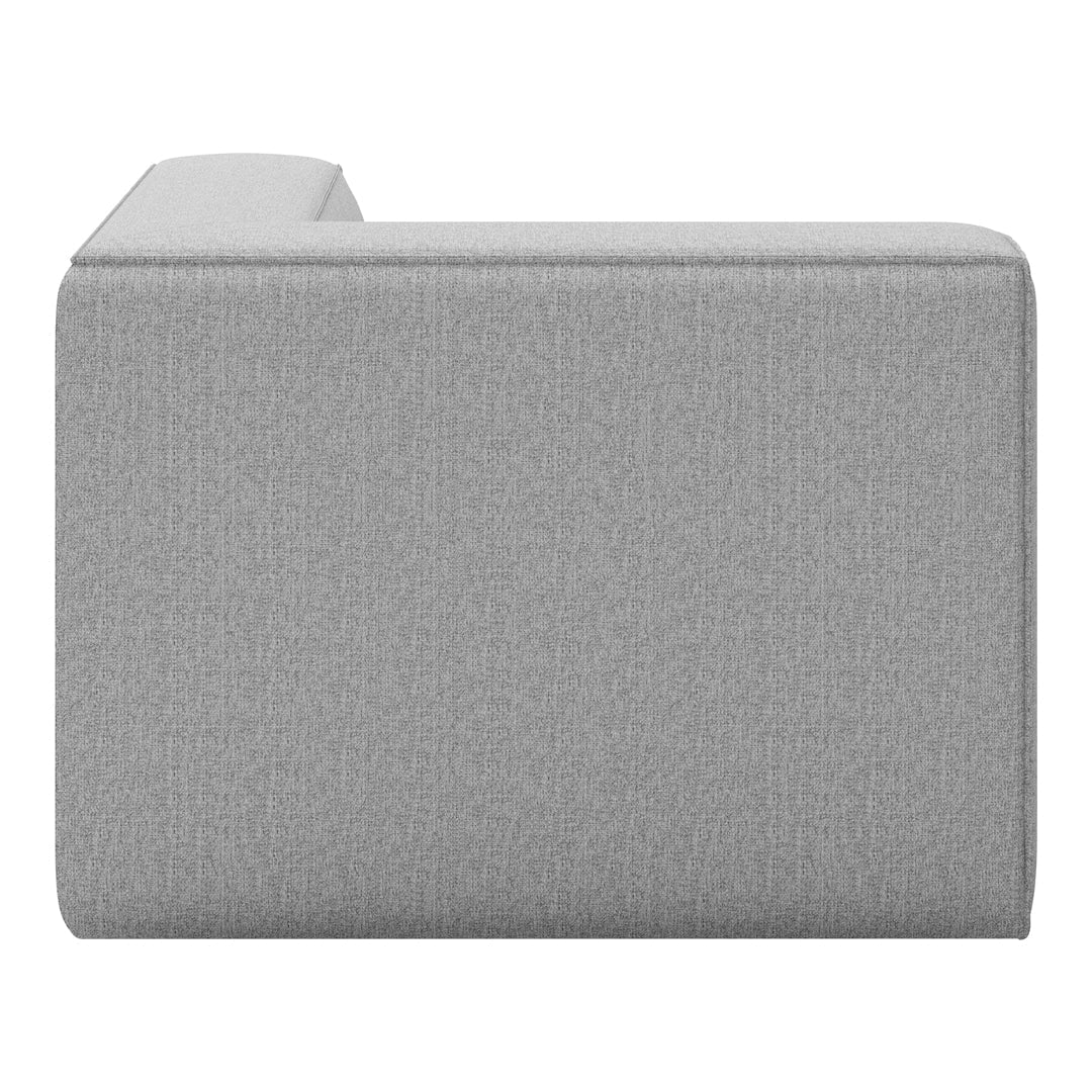Gray upholstered corner piece with a smooth, textured pattern, perfect for modern living spaces.