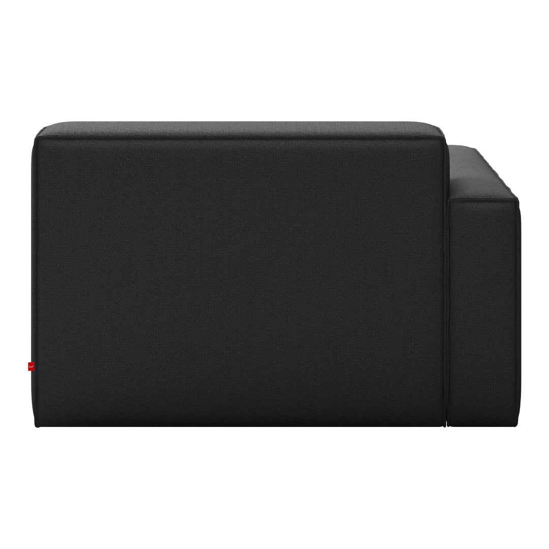 Black upholstered sofa section with a minimalist, solid color design. Simple lines and contemporary style.