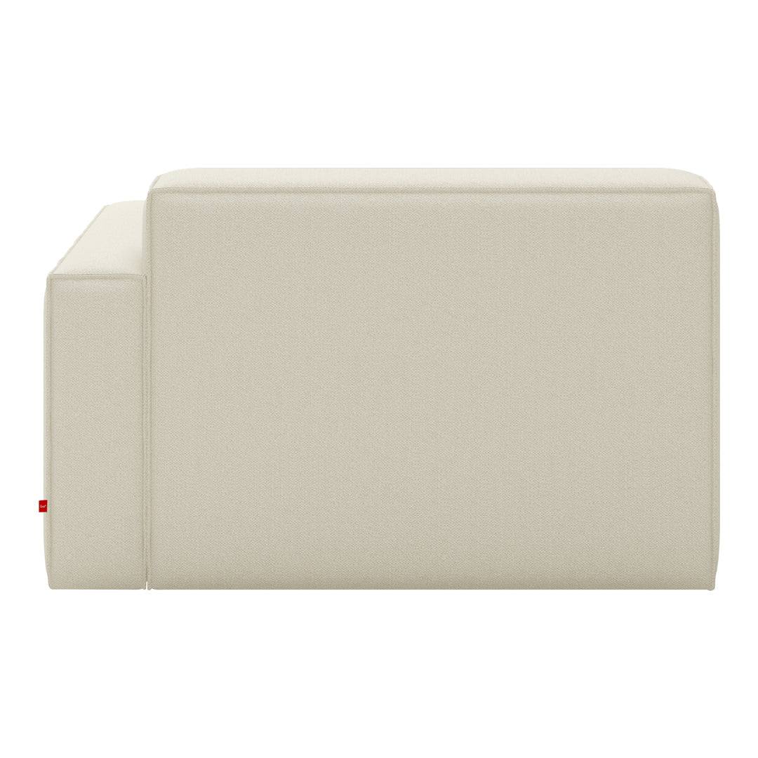 Beige upholstered couch with a smooth, minimalist design, perfect for modern living spaces.
