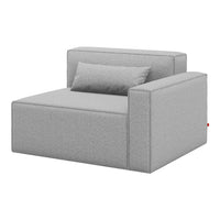 Gray upholstered armchair with a sleek design and subtle fabric texture, featuring a matching throw pillow.