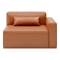 Tan leather chair with a sleek, minimalist design and a matching bolster pillow.