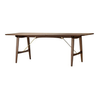 Walnut wood dining table with a sleek, smooth surface and minimalistic golden accents. Elegant and modern design.
