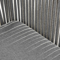 Gray and black striped fabric featuring varying widths of stripes for a modern look. Ideal for stylish upholstery.