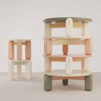 Colorful modern tables featuring soft pastels and earthy tones with smooth, curved edges. Perfect for any decor.
