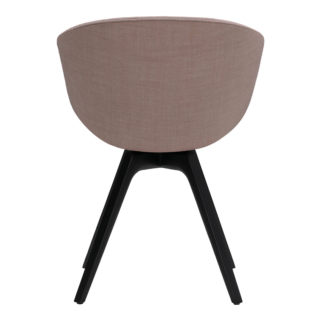Round pink upholstered chair with a textured finish and sleek black legs. Perfect for modern decor.