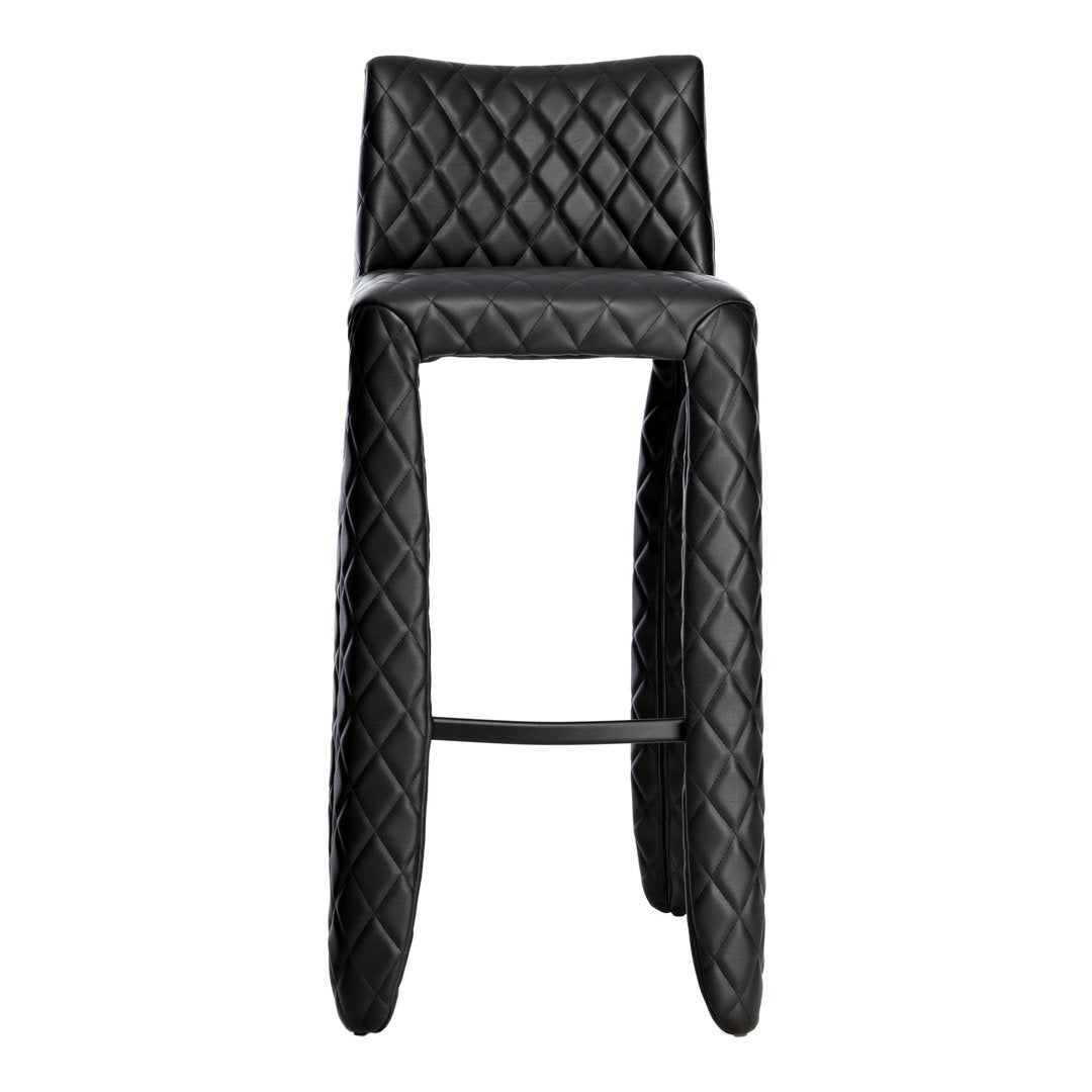 Black quilted bar stool with a sleek design and textured diamond pattern for modern aesthetics.