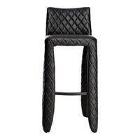 Black quilted bar stool with a sleek design and textured diamond pattern for modern aesthetics.
