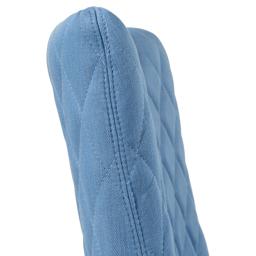 Light blue chair featuring a quilted diamond pattern for a stylish and modern look. Perfect for any decor.